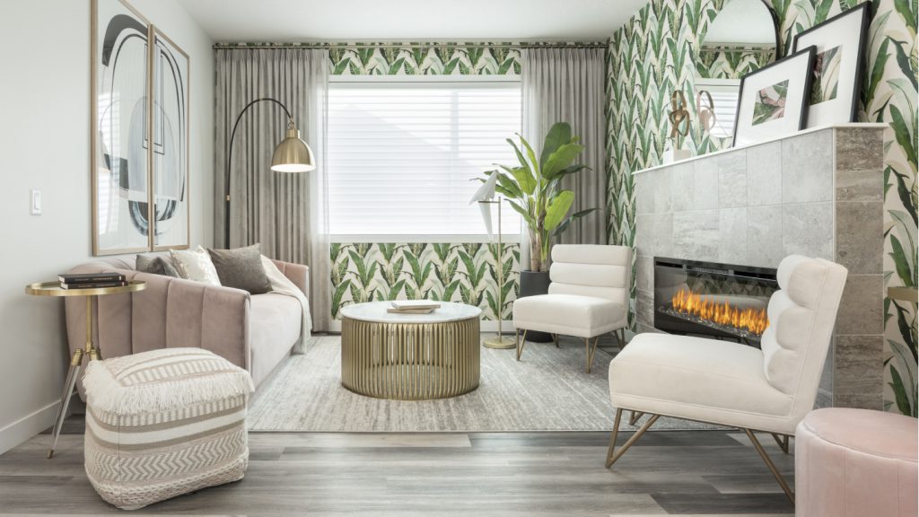 A living room with a fireplace and wallpaper with a leaf pattern.