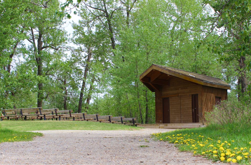 an amphitheatre and benches in fish creek park