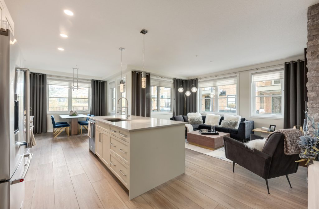 living room and kitchen in a cove properties condo